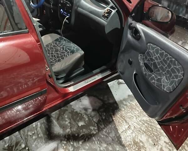 Красный Дэу Ланос, объемом двигателя 1.5 л и пробегом 200 тыс. км за 2250 $, фото 3 на Automoto.ua