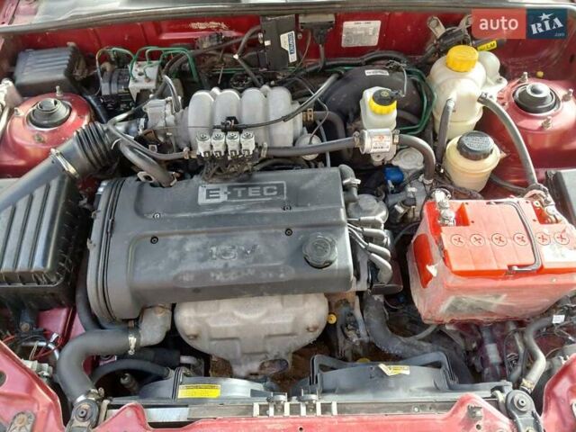 Червоний Деу Ланос, об'ємом двигуна 1.6 л та пробігом 240 тис. км за 2999 $, фото 22 на Automoto.ua