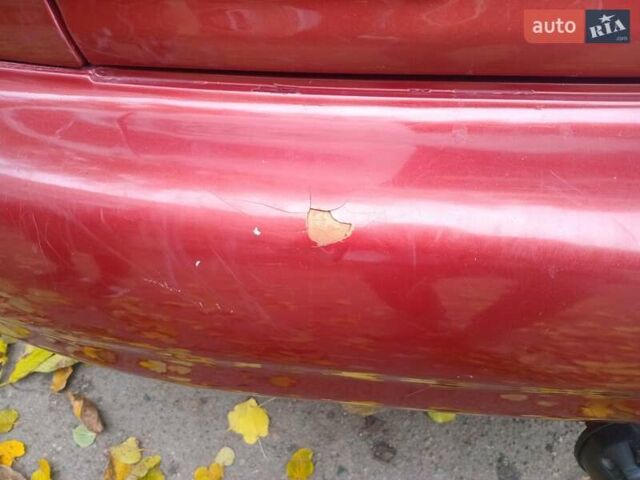 Красный Дэу Ланос, объемом двигателя 1.5 л и пробегом 320 тыс. км за 2300 $, фото 3 на Automoto.ua