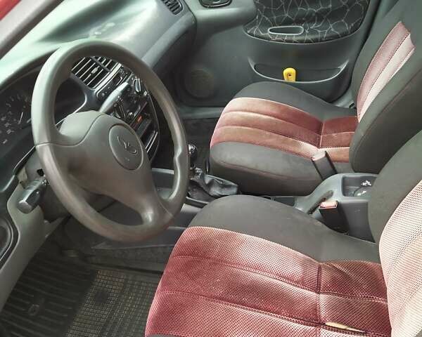 Червоний Деу Ланос, об'ємом двигуна 1.5 л та пробігом 208 тис. км за 1200 $, фото 6 на Automoto.ua