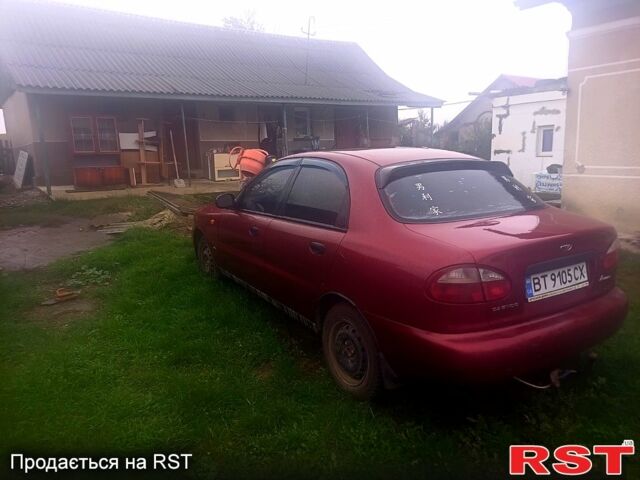 Деу Ланос 2004 у Тернополі на Automoto.ua Червоний Деу Ланос, об'ємом двигуна 1.6 л та пробігом 280 тис. км за 1200 $, фото 2 на Automoto.ua