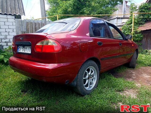 Деу Ланос 2004 у Мерефа на Automoto.ua Червоний Деу Ланос, об'ємом двигуна 1.5 л та пробігом 400 тис. км за 2200 $, фото 3 на Automoto.ua