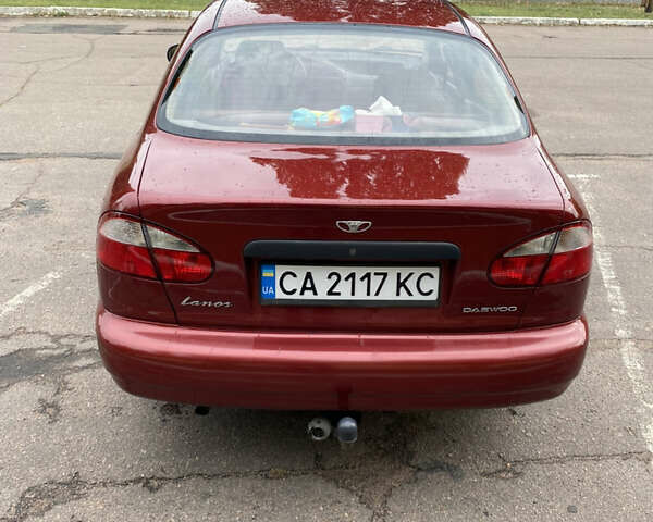 Красный Дэу Ланос, объемом двигателя 1.5 л и пробегом 264 тыс. км за 2800 $, фото 4 на Automoto.ua