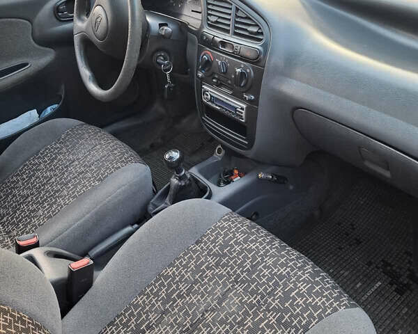 Красный Дэу Ланос, объемом двигателя 1.5 л и пробегом 228 тыс. км за 2999 $, фото 4 на Automoto.ua