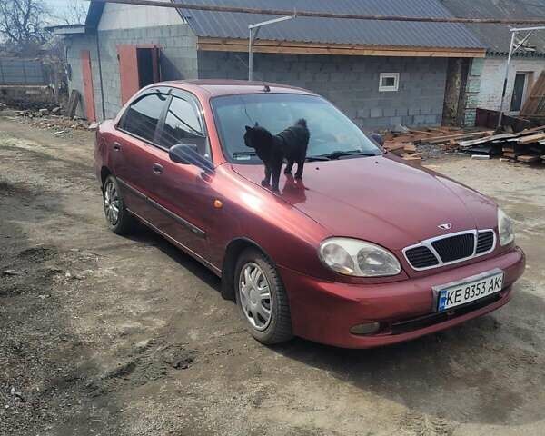 Красный Дэу Ланос, объемом двигателя 1.6 л и пробегом 255 тыс. км за 2000 $, фото 5 на Automoto.ua