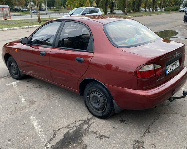 Красный Дэу Ланос, объемом двигателя 1.5 л и пробегом 264 тыс. км за 2800 $, фото 3 на Automoto.ua