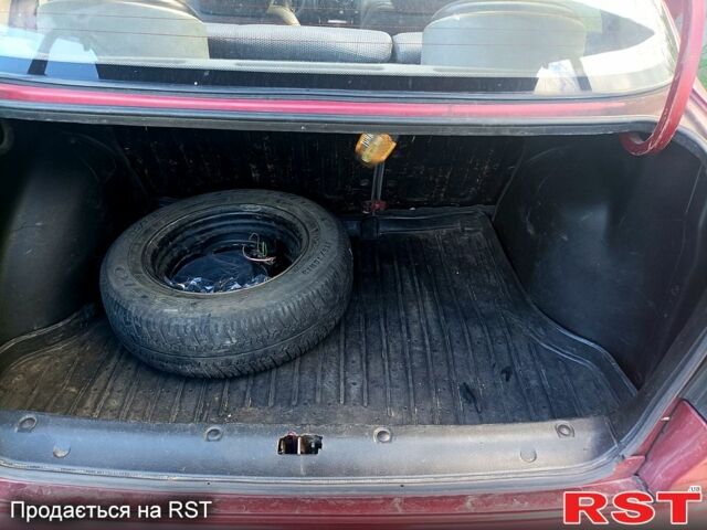 Красный Дэу Ланос, объемом двигателя 1.5 л и пробегом 267 тыс. км за 2200 $, фото 10 на Automoto.ua