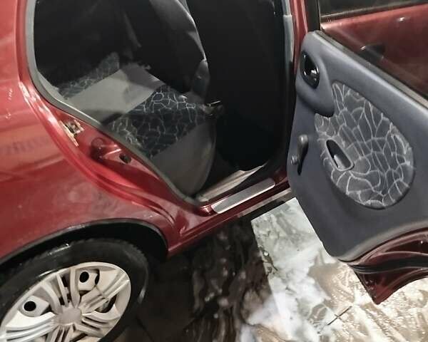 Красный Дэу Ланос, объемом двигателя 1.5 л и пробегом 200 тыс. км за 2250 $, фото 4 на Automoto.ua