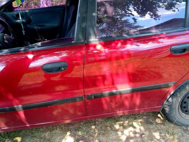 Дэу Ланос 2004 в Великой Багачке на Automoto.ua Красный Дэу Ланос, объемом двигателя 1.5 л и пробегом 270 тыс. км за 2550 $, фото 1 на Automoto.ua