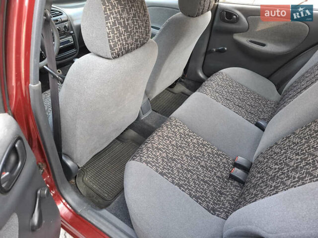 Красный Дэу Ланос, объемом двигателя 1.5 л и пробегом 228 тыс. км за 2999 $, фото 7 на Automoto.ua