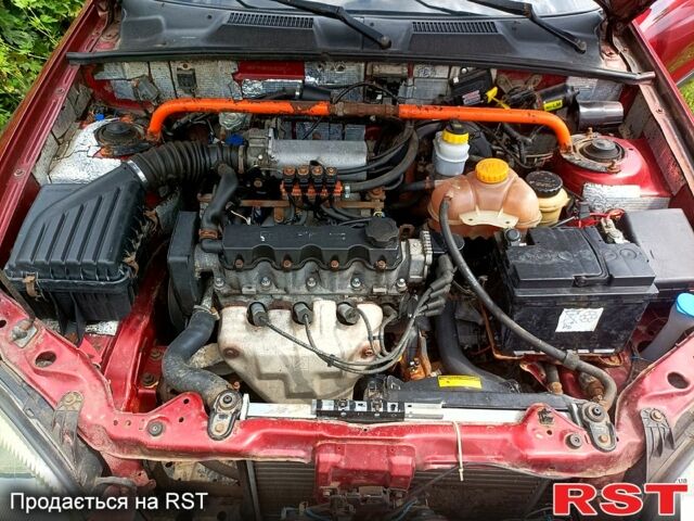 Деу Ланос 2004 у Мерефа на Automoto.ua Червоний Деу Ланос, об'ємом двигуна 1.5 л та пробігом 400 тис. км за 2200 $, фото 9 на Automoto.ua