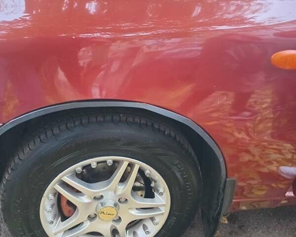 Красный Дэу Ланос, объемом двигателя 1.5 л и пробегом 320 тыс. км за 2300 $, фото 32 на Automoto.ua