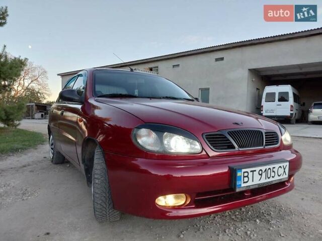 Червоний Деу Ланос, об'ємом двигуна 1.6 л та пробігом 240 тис. км за 2999 $, фото 1 на Automoto.ua
