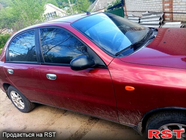 Красный Дэу Ланос, объемом двигателя 1.5 л и пробегом 267 тыс. км за 2200 $, фото 3 на Automoto.ua