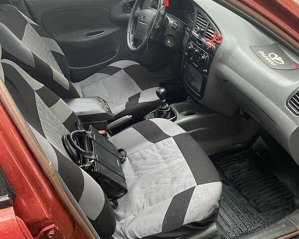 Красный Дэу Ланос, объемом двигателя 1.6 л и пробегом 297 тыс. км за 2500 $, фото 8 на Automoto.ua