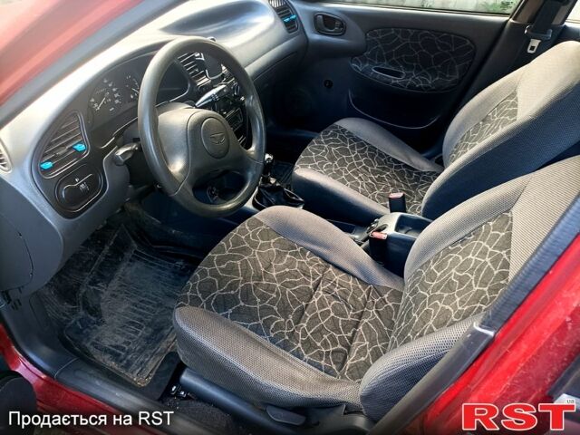 Красный Дэу Ланос, объемом двигателя 1.5 л и пробегом 267 тыс. км за 2200 $, фото 9 на Automoto.ua