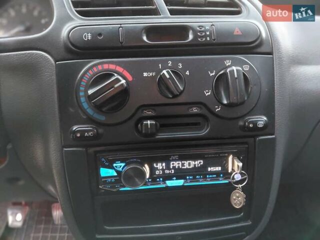 Червоний Деу Ланос, об'ємом двигуна 1.6 л та пробігом 240 тис. км за 2999 $, фото 11 на Automoto.ua