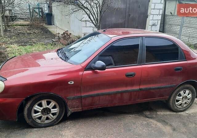 Красный Дэу Ланос, объемом двигателя 1.5 л и пробегом 200 тыс. км за 2000 $, фото 1 на Automoto.ua