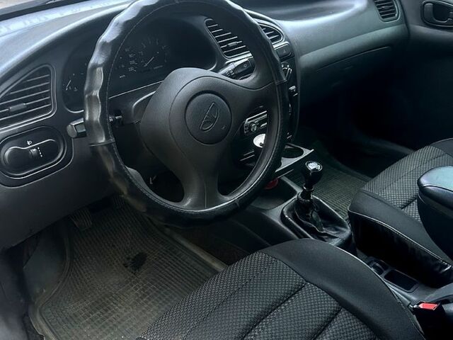 Червоний Деу Ланос, об'ємом двигуна 1.5 л та пробігом 200 тис. км за 1650 $, фото 4 на Automoto.ua