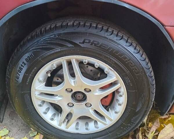 Красный Дэу Ланос, объемом двигателя 1.5 л и пробегом 320 тыс. км за 2300 $, фото 7 на Automoto.ua