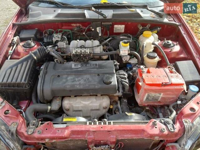 Червоний Деу Ланос, об'ємом двигуна 1.6 л та пробігом 240 тис. км за 2999 $, фото 23 на Automoto.ua