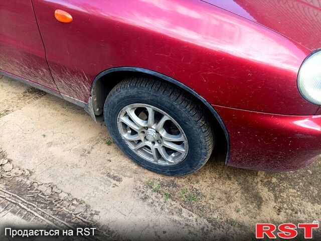 Красный Дэу Ланос, объемом двигателя 1.5 л и пробегом 267 тыс. км за 2200 $, фото 2 на Automoto.ua
