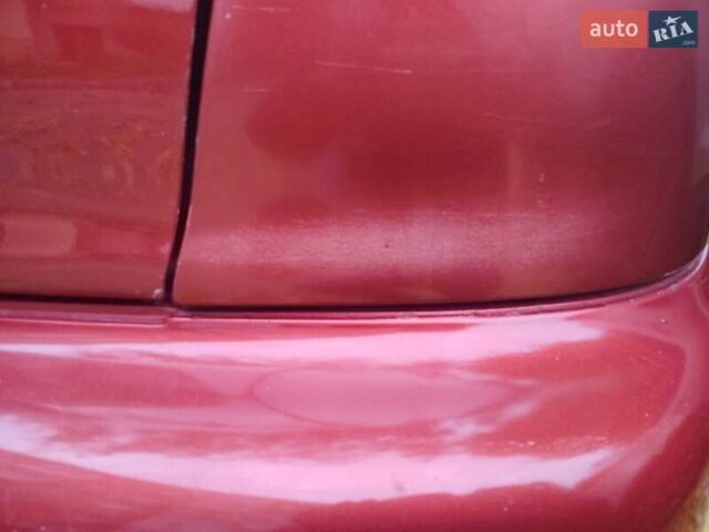 Красный Дэу Ланос, объемом двигателя 1.5 л и пробегом 320 тыс. км за 2300 $, фото 26 на Automoto.ua