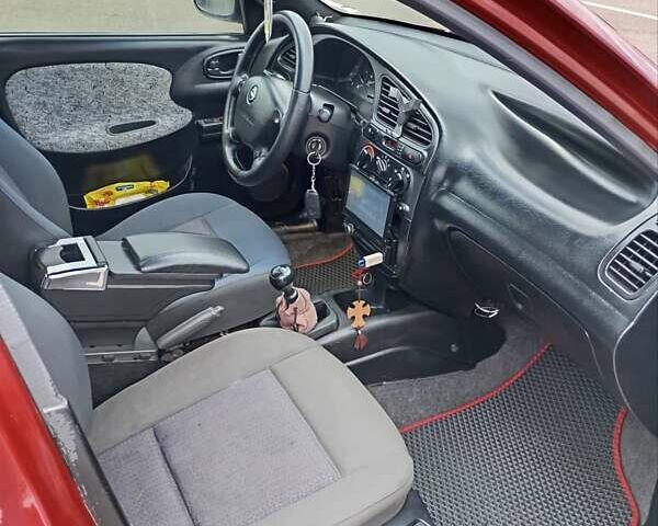 Красный Дэу Ланос, объемом двигателя 1.5 л и пробегом 390 тыс. км за 2399 $, фото 11 на Automoto.ua
