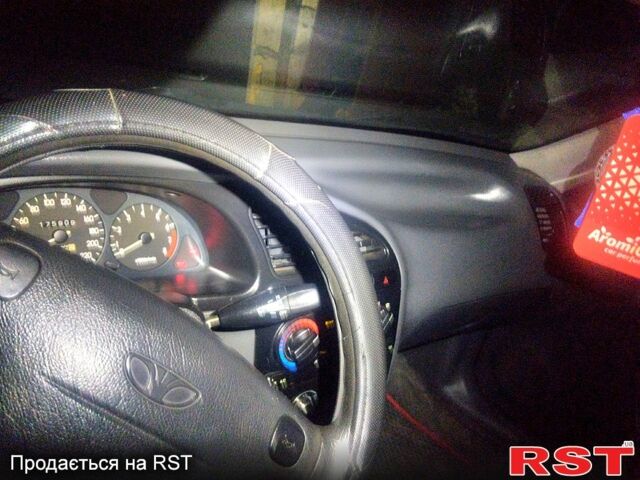 Червоний Деу Ланос, об'ємом двигуна 1.6 л та пробігом 175 тис. км за 2500 $, фото 4 на Automoto.ua