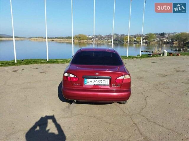 Красный Дэу Ланос, объемом двигателя 1.6 л и пробегом 173 тыс. км за 2600 $, фото 5 на Automoto.ua