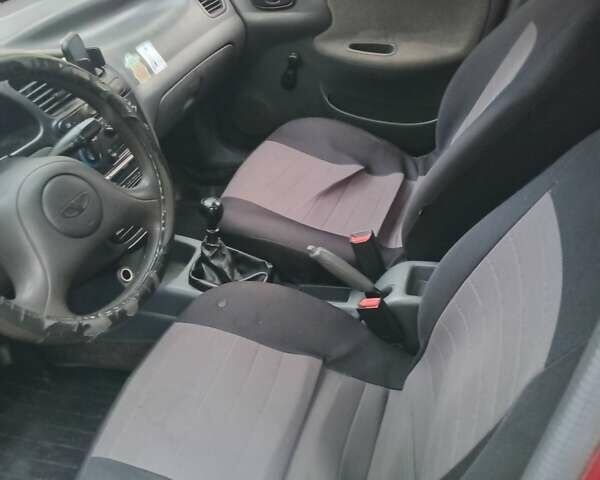 Красный Дэу Ланос, объемом двигателя 1.5 л и пробегом 320 тыс. км за 2300 $, фото 39 на Automoto.ua