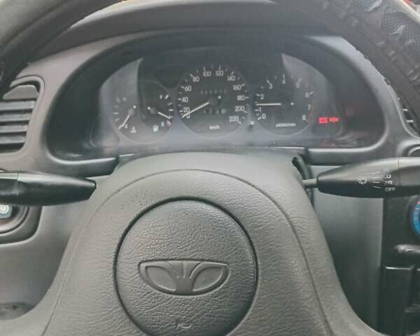 Красный Дэу Ланос, объемом двигателя 1.5 л и пробегом 320 тыс. км за 2300 $, фото 33 на Automoto.ua