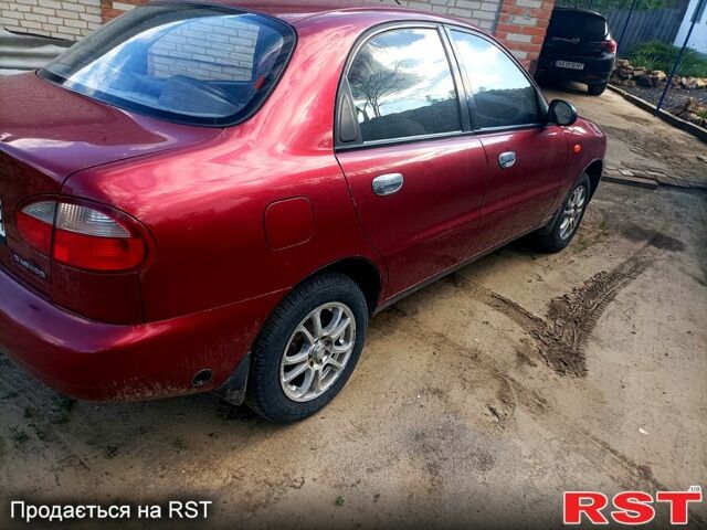 Красный Дэу Ланос, объемом двигателя 1.5 л и пробегом 267 тыс. км за 2200 $, фото 5 на Automoto.ua