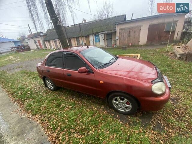 Красный Дэу Ланос, объемом двигателя 1.6 л и пробегом 297 тыс. км за 2500 $, фото 4 на Automoto.ua