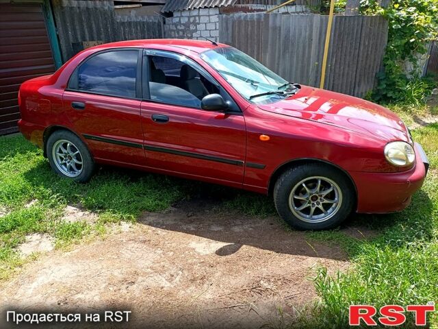 Деу Ланос 2004 у Мерефа на Automoto.ua Червоний Деу Ланос, об'ємом двигуна 1.5 л та пробігом 400 тис. км за 2200 $, фото 4 на Automoto.ua