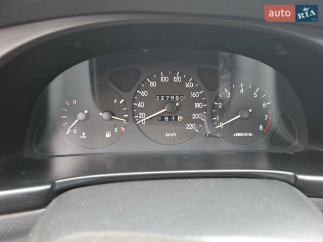 Красный Дэу Ланос, объемом двигателя 1.5 л и пробегом 228 тыс. км за 2999 $, фото 8 на Automoto.ua