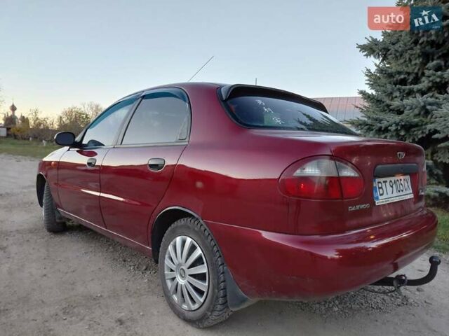 Червоний Деу Ланос, об'ємом двигуна 1.6 л та пробігом 240 тис. км за 2999 $, фото 6 на Automoto.ua