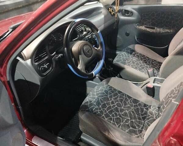 Красный Дэу Ланос, объемом двигателя 1.5 л и пробегом 200 тыс. км за 2250 $, фото 6 на Automoto.ua