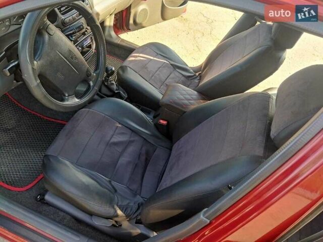Красный Дэу Ланос, объемом двигателя 1.6 л и пробегом 173 тыс. км за 2600 $, фото 7 на Automoto.ua