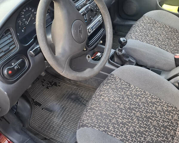 Красный Дэу Ланос, объемом двигателя 1.5 л и пробегом 228 тыс. км за 2999 $, фото 5 на Automoto.ua