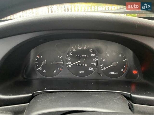 Красный Дэу Ланос, объемом двигателя 1.6 л и пробегом 297 тыс. км за 2500 $, фото 5 на Automoto.ua