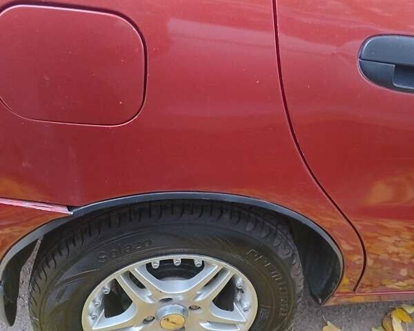 Красный Дэу Ланос, объемом двигателя 1.5 л и пробегом 320 тыс. км за 2300 $, фото 4 на Automoto.ua