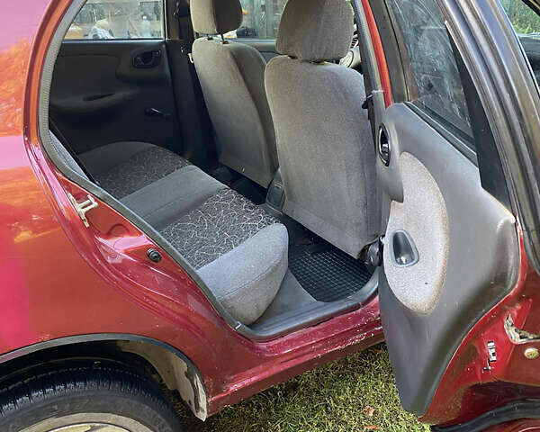 Деу Ланос 2005 у Коломаке на Automoto.ua Червоний Деу Ланос, об'ємом двигуна 1.5 л та пробігом 320 тис. км за 1700 $, фото 6 на Automoto.ua