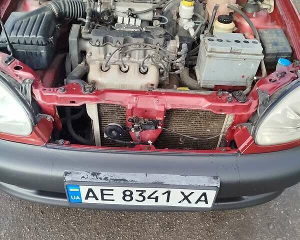 Красный Дэу Ланос, объемом двигателя 1.5 л и пробегом 216 тыс. км за 2500 $, фото 9 на Automoto.ua