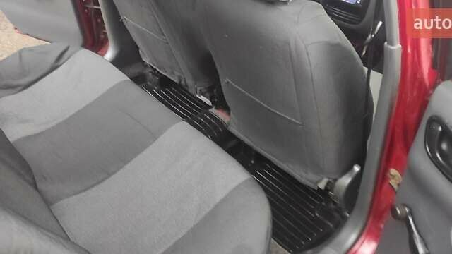 Красный Дэу Ланос, объемом двигателя 1.5 л и пробегом 260 тыс. км за 2500 $, фото 13 на Automoto.ua