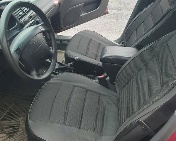 Красный Дэу Ланос, объемом двигателя 1.5 л и пробегом 226 тыс. км за 2400 $, фото 19 на Automoto.ua