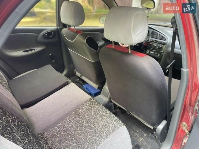 Червоний Деу Ланос, об'ємом двигуна 1.3 л та пробігом 128 тис. км за 1800 $, фото 4 на Automoto.ua