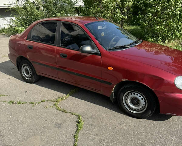 Красный Дэу Ланос, объемом двигателя 1.5 л и пробегом 157 тыс. км за 1435 $, фото 4 на Automoto.ua