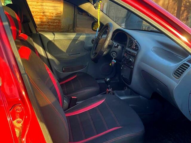 Красный Дэу Ланос, объемом двигателя 1.5 л и пробегом 200 тыс. км за 2800 $, фото 6 на Automoto.ua