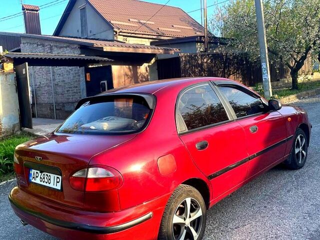 Красный Дэу Ланос, объемом двигателя 1.5 л и пробегом 200 тыс. км за 2800 $, фото 3 на Automoto.ua